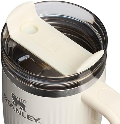 STANLEY Quencher H2.0 Tumbler with Handle and Straw 20 oz | Flowstate 3-Position Lid | Cup Holder Compatible for Travel | Insulated Stainless Steel Cup | BPA-Free | Fluted Cream Gloss