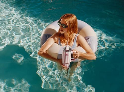 STANLEY Quencher H2.0 Flow State Tumbler, 40 oz, Peach Whip Cabana Gloss