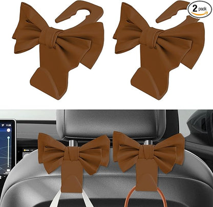 2PCS Car Purse Hooks, Car Hooks for Purses and Bags Cute, Cute Bow Shaped Vehicle Backseat Storage Hanger, Auto Leather Bow Back Seat Storage Hanging Holder Universal for Women Girls (Brown)
