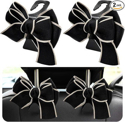 2 PCS Car Seat Headrest Hooks, Cute Bow Shaped Vehicle Backseat Storage Hooks, Leather Bow Shaped Sturdy Car Seat Back Hooks for Purses/Coats/Umbrellas, Car Accessories (White Edge)