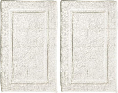 mDesign 100% Cotton Bath Mat - Soft Hotel-Style Rectangular Bathroom Floor Rug - Plush, Water Absorbent Cloth Bathmat for Outside Bathtub/Shower, Machine Washable Cotton Bath Rug, 2 Pack, Natural/Tan